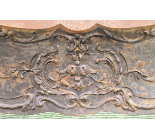Large baroque cast iron insert, artistically crafted, that can be adapted to fit the mantel of a marble fireplace. 2
