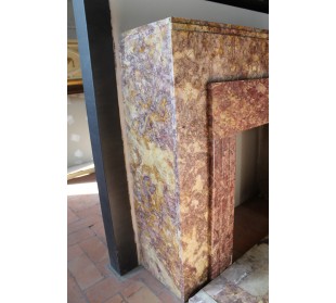 Antique Art Deco style fireplace carved in Brocatello marble, a marble that is quite rare today. 2