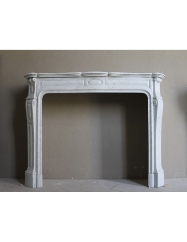 ANTIQUE LOUIS XV "PIED GALBÉ TRANSITION" FIREPLACE MANTEL CARVED IN WHITE CARRARA MARBLE.