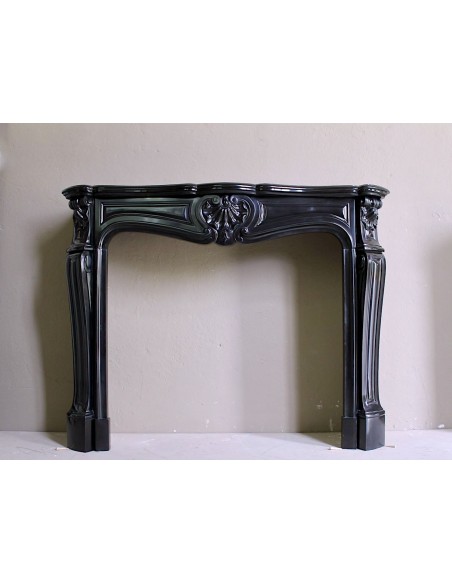 Antique authentic Louis XV Black Belgium marble fireplace surround dating back to the 19th century