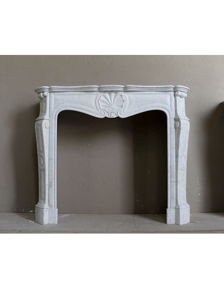 Authentic original Louis XV "Shell" fireplace mantel in white Carrara marble