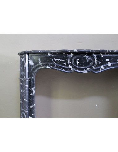 Antique Black Marquinia baroque fireplace mantel.