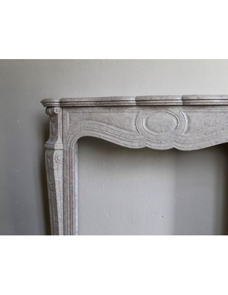 057 ANTIQUE ELEGANT LOUIS XV "PIED GALBÉ" FIRE SURROUND CARVED IN BEIGE LUNEL MARBLE
