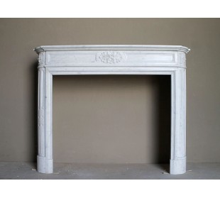 Original Louis XVI "Démi-Lune" fireplace mantel carved in white Carrara marble