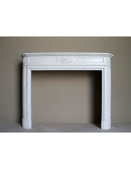 Original Louis XVI "Démi-Lune" fireplace mantel carved in white Carrara marble