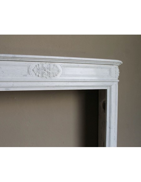 259 ANTIQUE LOUIS XVI "DÉMI-LUNE TROIS FLEURS" FIREPLACE MANTEL IN WHITE CARRARA MARBLE