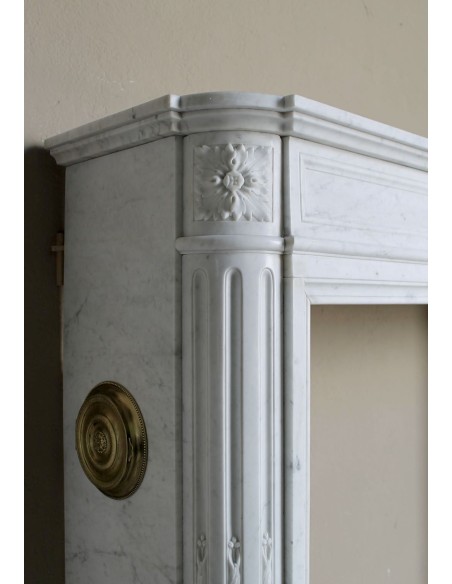259 ANTIQUE LOUIS XVI "DÉMI-LUNE TROIS FLEURS" FIREPLACE MANTEL IN WHITE CARRARA MARBLE