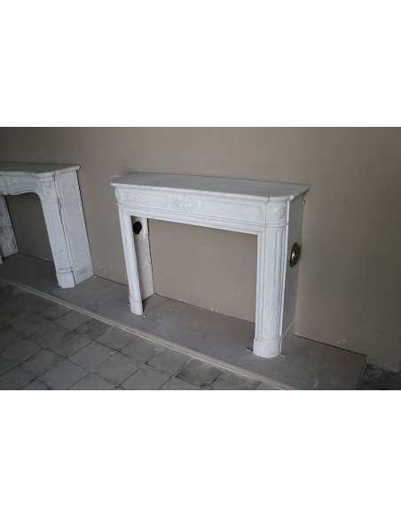 259 ANTIQUE LOUIS XVI "DÉMI-LUNE TROIS FLEURS" FIREPLACE MANTEL IN WHITE CARRARA MARBLE