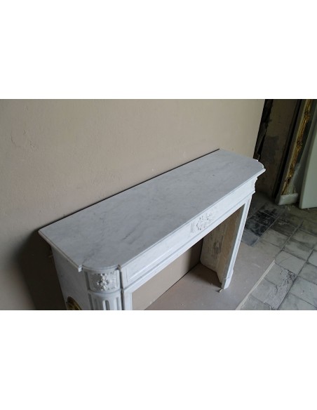 259 ANTIQUE LOUIS XVI "DÉMI-LUNE TROIS FLEURS" FIREPLACE MANTEL IN WHITE CARRARA MARBLE