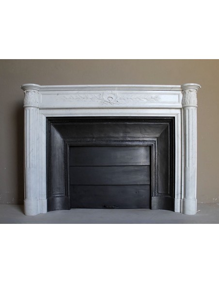 Important Louis XVI marble fireplace mantel carved in White marble with fluted Neoclassical columns
