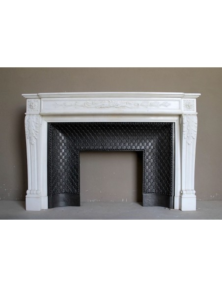 Exceptional neoclassical fireplace carved in a superb white Statuary Carrara marble.