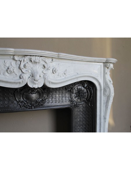 070 AG ANTIQUE FLORAL LOUIS XV "DAUPHIN" FIREPLACE MANTEL IN WHITE CARRARA "P" MARBLE WITH ITS OWN ARTISTIC CAST IRON INSERT