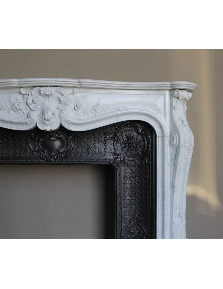 070 AG ANTIQUE FLORAL LOUIS XV "DAUPHIN" FIREPLACE MANTEL IN WHITE CARRARA "P" MARBLE WITH ITS OWN ARTISTIC CAST IRON INSERT