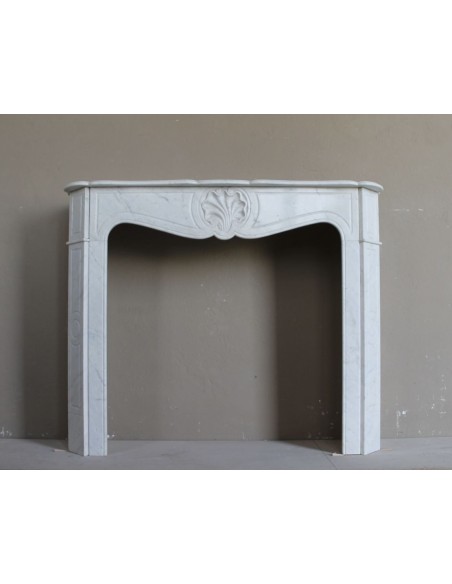 Antique original mantelpiece carved in White Carrara marble with sculptures of a shell