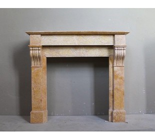 Antique original Louis Philippe Modillon fireplace mantel carved in yellow marble. This fire surround is at a very low price.