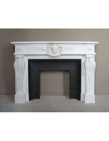 Important antique Neoclassical fireplace mantel carved in white Statuary marble with the sculpture of Marie Antoinette's face.