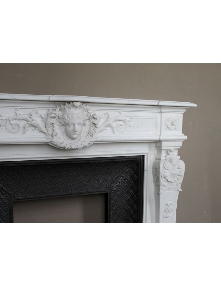 219 AG EXCEPTIONAL LOUIS XVI "TÊTE DE FEMME" FIREPLACE SURROUND CARVED IN WHITE STATUARY MARBLE
