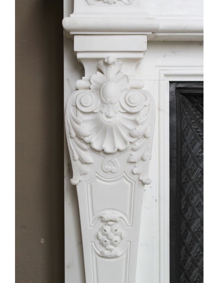 219 AG EXCEPTIONAL LOUIS XVI "TÊTE DE FEMME" FIREPLACE SURROUND CARVED IN WHITE STATUARY MARBLE