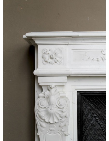 219 AG EXCEPTIONAL LOUIS XVI "TÊTE DE FEMME" FIREPLACE SURROUND CARVED IN WHITE STATUARY MARBLE
