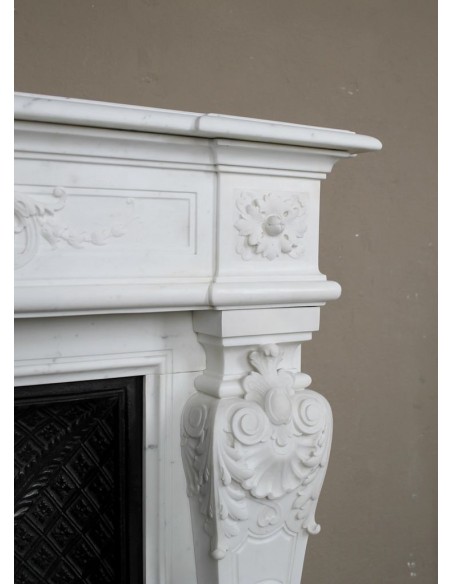 219 AG EXCEPTIONAL LOUIS XVI "TÊTE DE FEMME" FIREPLACE SURROUND CARVED IN WHITE STATUARY MARBLE