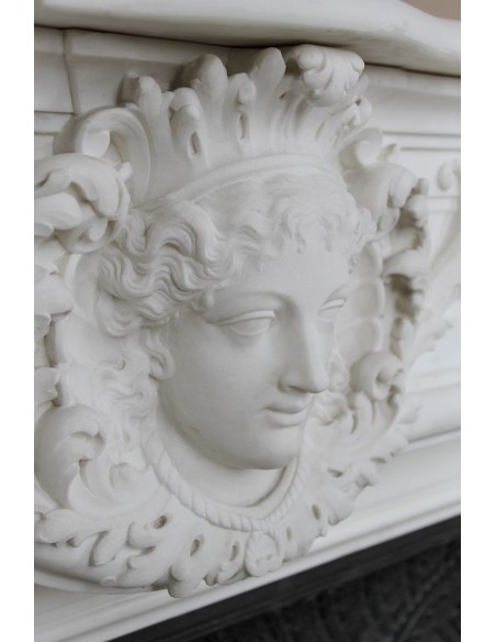 219 AG EXCEPTIONAL LOUIS XVI "TÊTE DE FEMME" FIREPLACE SURROUND CARVED IN WHITE STATUARY MARBLE