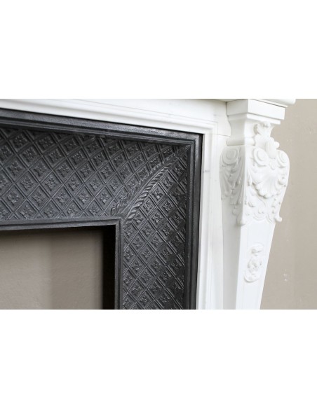 219 AG EXCEPTIONAL LOUIS XVI "TÊTE DE FEMME" FIREPLACE SURROUND CARVED IN WHITE STATUARY MARBLE