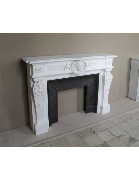 219 AG EXCEPTIONAL LOUIS XVI "TÊTE DE FEMME" FIREPLACE SURROUND CARVED IN WHITE STATUARY MARBLE