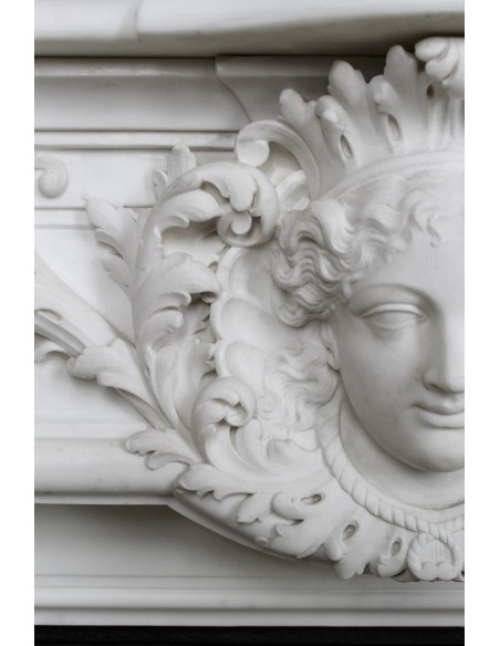 219 AG EXCEPTIONAL LOUIS XVI "TÊTE DE FEMME" FIREPLACE SURROUND CARVED IN WHITE STATUARY MARBLE