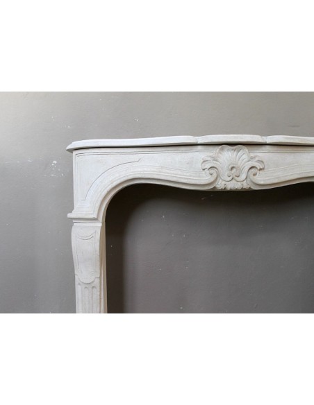 905 ANTIQUE "TRANSITION" FIREPLACE MANTEL CARVED IN “PIERRE DORÉE” STONE