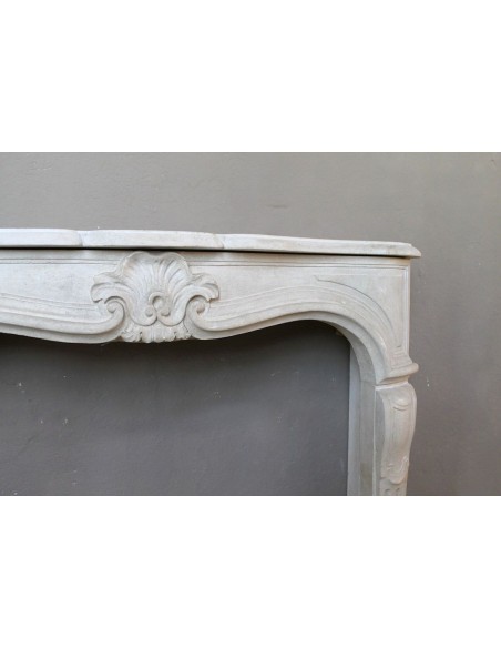 905 ANTIQUE "TRANSITION" FIREPLACE MANTEL CARVED IN “PIERRE DORÉE” STONE