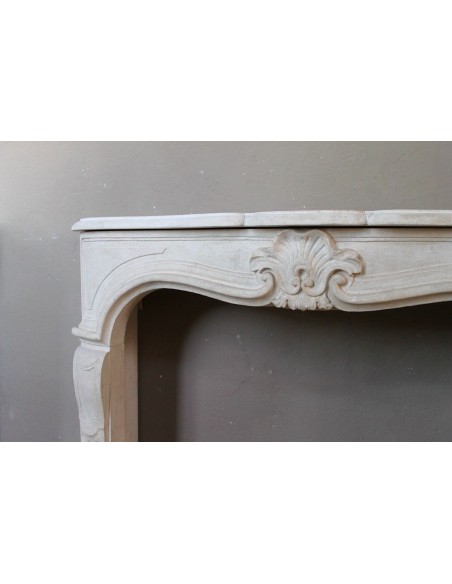 905 ANTIQUE "TRANSITION" FIREPLACE MANTEL CARVED IN “PIERRE DORÉE” STONE