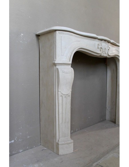 905 ANTIQUE "TRANSITION" FIREPLACE MANTEL CARVED IN “PIERRE DORÉE” STONE