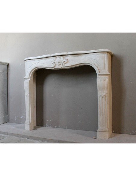 905 ANTIQUE "TRANSITION" FIREPLACE MANTEL CARVED IN “PIERRE DORÉE” STONE