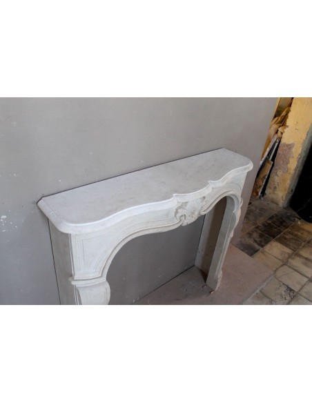 905 ANTIQUE "TRANSITION" FIREPLACE MANTEL CARVED IN “PIERRE DORÉE” STONE