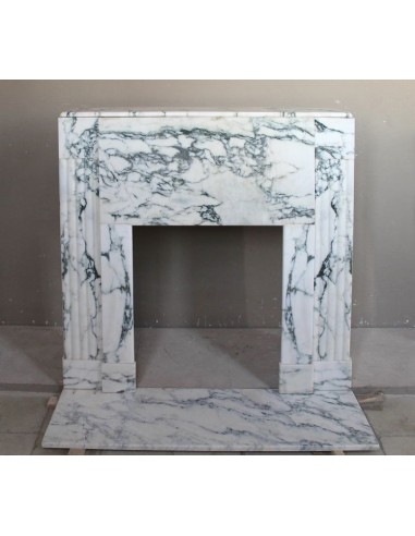Antique Art Deco fireplace mantel carved in charming Medicean Breccia marble.