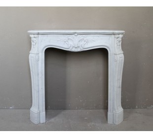 Antique very small and lovely marble fireplace mantel in Baroque style.
