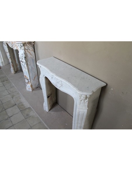 014 IMPORTANT VERY SMALL FLORAL LOUIS XV FIREPLACE MANTEL CARVED IN WHITE CARRARA "P" MARBLE