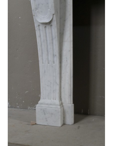206 SMALL ANTIQUE LOUIS XVI "LANGUETTE" FIREPLACE MANTEL SCULPTED OUT OF WHITE CARRARA MARBLE
