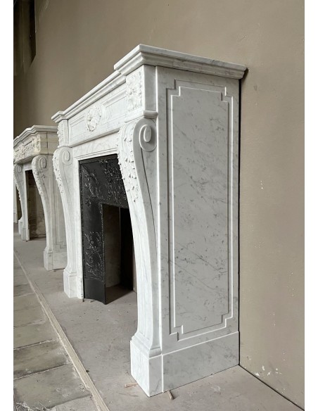 222 AG ANTIQUE LOUIS XVI "TROIS FLEURS" FIREPLACE MANTEL IN WHITE CARRARA MARBLE
