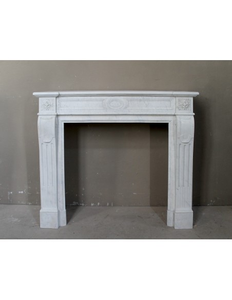 Original antique white marble fireplace dating back to the 19th century. This marble mantel is called "Languette".