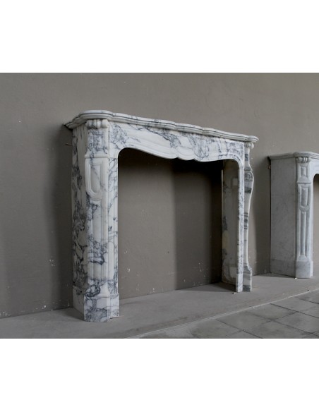 ANTIQUE LOUIS XV PIED GALBÉ FIREPLACE SURROUND IN ITALIAN WHITE VEINED ARABESCATO MARBLE