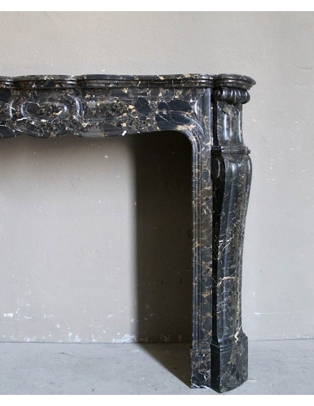 026 ANTIQUE LOUIS XV "PIED GALBÉ" FIREPLACE MANTEL IN BLACK SAINT LAURENT MARBLE