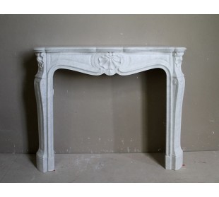 Antique White Carrara marble fireplace. This mantel is called "Three Shells" because of its decorations and sculptures.