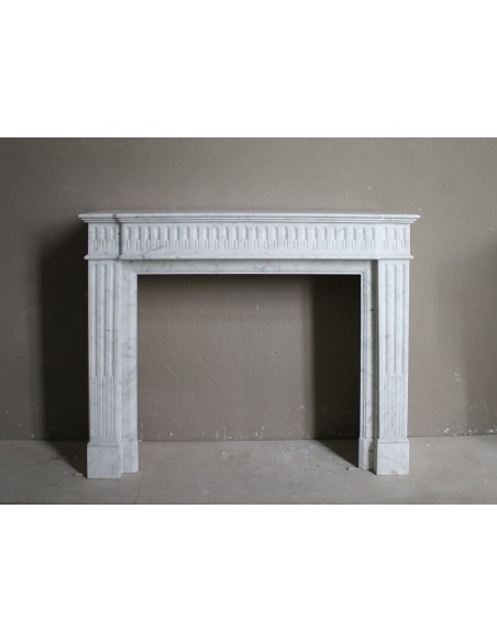 Antique Neoclassical fireplace mantel in Italian "Pure" White Carrara marble ("Bianco Gioia").