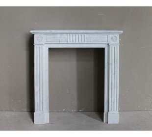 Beautiful little Neoclassical marble fireplace mantel. Antique, genuine one-of-a-kind piece.