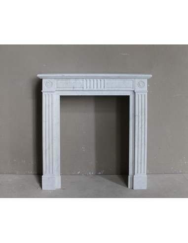 Beautiful little Neoclassical marble fireplace mantel. Antique, genuine one-of-a-kind piece.