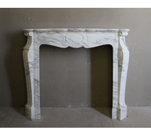 Antique marble fireplace mantel in Italian White Arabescato Carrara marble.