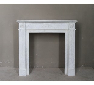 Antique Louis XVI marble fireplace mantel sculpted in Italian White Calacatta.