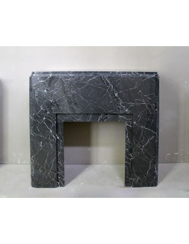 Antique authentic Art Deco marble fireplace mantel carved from Black Marquinia Gold marble.