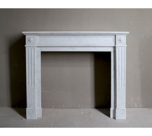 Antique white Carrara Neoclassical marble fireplace mantel.